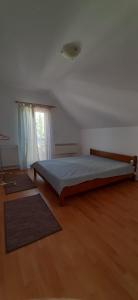 Postel nebo postele na pokoji v ubytování Simonfi Villa