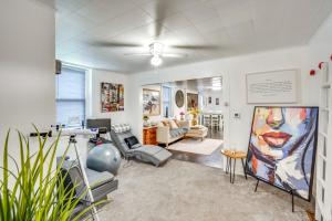 a living room with a painting on the wall at Cozy Berkshires Vacation Rental Near Hiking! in Chester