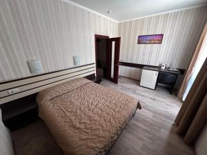 Postel nebo postele na pokoji v ubytování Mini-Hotel in Kharkiv