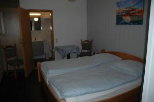 Postel nebo postele na pokoji v ubytování Hotel Kappelner Hof