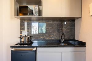 Η κουζίνα ή μικρή κουζίνα στο MTP - The Privilege Moema By Anora Spaces