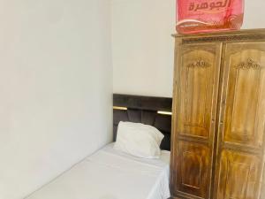 Postel nebo postele na pokoji v ubytování Riad Dar Lokman