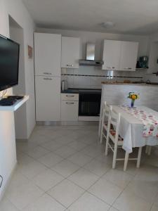 Kuchyň nebo kuchyňský kout v ubytování Apartment Miletic