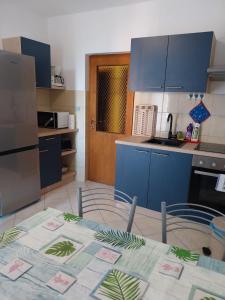 Kuchyň nebo kuchyňský kout v ubytování Apartment Miletic