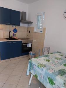 Kuchyň nebo kuchyňský kout v ubytování Apartment Miletic