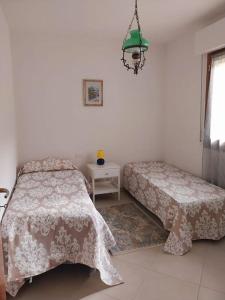 Ένα ή περισσότερα κρεβάτια σε δωμάτιο στο nel Chianti vicino Firenze +4 φωτογραφίες