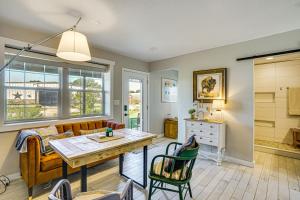 a living room with a table and a couch at Dog-Friendly Guest House on Horse Ranch in Azle! in Azle