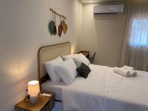 Ένα ή περισσότερα κρεβάτια σε δωμάτιο στο Bangalô com piscina e privacidade a 6 km do centro +29 φωτογραφίες