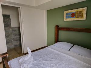 Letto o letti in una camera di Haven Hotel