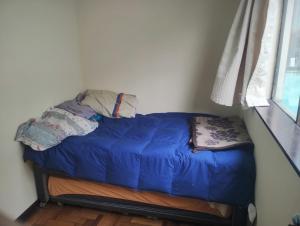 Postel nebo postele na pokoji v ubytování Habitación en departamento céntrico de Valparaíso