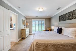 a bedroom with a large bed and a window at Silverado Condo in Napa +11 photos