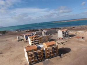 an aerial view of a beach with buildings and the ocean at Studio Mira Mare in Sal Rei