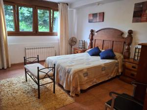 Katil atau katil-katil dalam bilik di Apartamentos la Higar