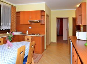 A kitchen or kitchenette at Apartmany Broma