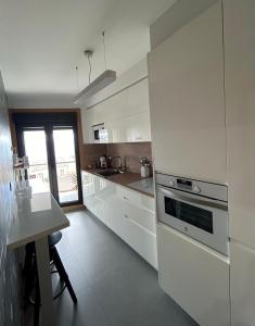 Kuchnia lub aneks kuchenny w obiekcie AMIVERA-MAR, vistas a la Ría de Vigo, Cangas