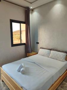 Postel nebo postele na pokoji v ubytování Sea Breeze 5