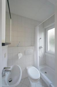 Koupelna v ubytování Appart International Boarding House + 11 fotografií