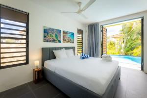 Letto o letti in una camera di Tropical Paradise at Jan Thiel with Private Pool
