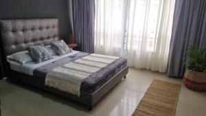 Voodi või voodid majutusasutuse TORRE EJECUTIVA hotel toas