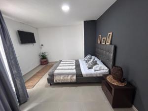 Voodi või voodid majutusasutuse TORRE EJECUTIVA hotel toas