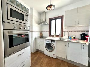 Kuchyň nebo kuchyňský kout v ubytování Pambnb - Charming Seaview Apartment