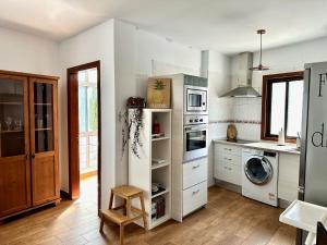 Kuchyň nebo kuchyňský kout v ubytování Pambnb - Charming Seaview Apartment