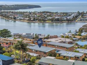 an aerial view of a city and a river at Hydra 8 in Merimbula