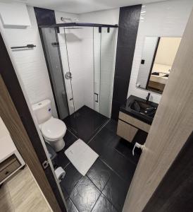 Koupelna v ubytování Hostel Boutique Nido de Loros + 37 fotografií