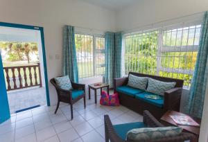 Posezení v ubytování Chalets d'Anse Forbans SelfCatering