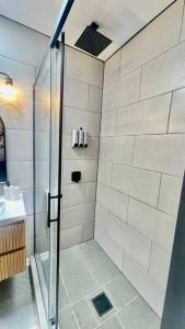 a bathroom with a shower and a sink at Apartment A, Restful,Cozy, close Sunland Park Mall in El Paso