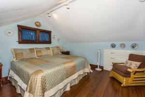 Ένα ή περισσότερα κρεβάτια σε δωμάτιο στο Mistletoe House