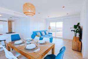 Posedenie v ubytovaní Apartamento prémium con 5 Piscinas Barbacoa Tenis Frontenis