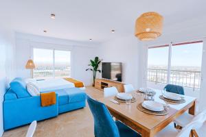 Posedenie v ubytovaní Apartamento prémium con 5 Piscinas Barbacoa Tenis Frontenis