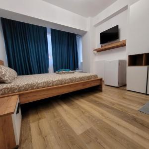 Postel nebo postele na pokoji v ubytování Vila Ayra