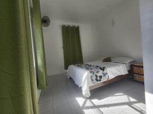 Uma cama ou camas num quarto em Kap Soley - Ile Rodrigues