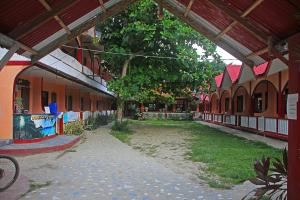 Zahrada ubytování JBR Tourist Inn II - Port Barton