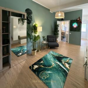 a living room with a mermaid rug at Dimora Sovrana - Urban Jungle in Matera