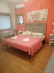 Letto o letti in una camera di Medea rooms palermo centro