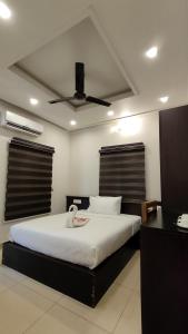 Voodi või voodid majutusasutuse Aroma Ayur Heritage toas