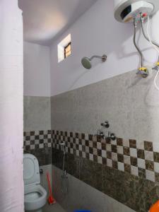 Ένα μπάνιο στο Chandra Shila Guest House, Sonprayag