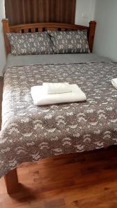 a white tray sitting on top of a bed at Sroysuwan Pool villa in Khanom +23 photos