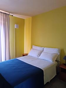 Postel nebo postele na pokoji v ubytování Ai canipai