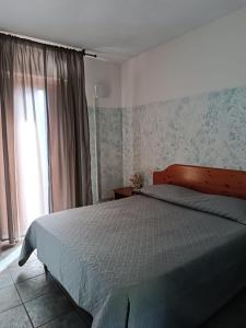 Postel nebo postele na pokoji v ubytování Ai canipai + 37 fotografií