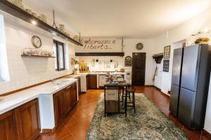 Kuchyň nebo kuchyňský kout v ubytování Cascina Bella Relais