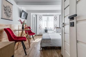 Łóżko lub łóżka w pokoju w obiekcie Góralskie Kąciki