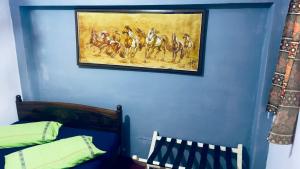 Postel nebo postele na pokoji v ubytování Singh Brothers