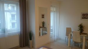 Koupelna v ubytování Apartamenty Feniks & Pegaz + 37 fotografií