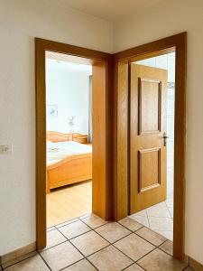 Posteľ alebo postele v izbe v ubytovaní Auerschmied Appartements