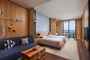 Postel nebo postele na pokoji v ubytování Grand Hyatt Sanya Haitang Bay Resort and Spa + 149 fotografií