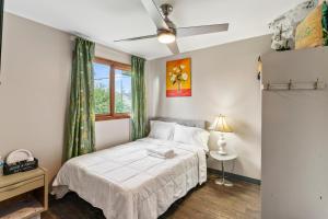 Postel nebo postele na pokoji v ubytování Simple Deluxe Private Room
